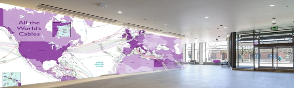 Building lobby with large mural global submarine internet cables